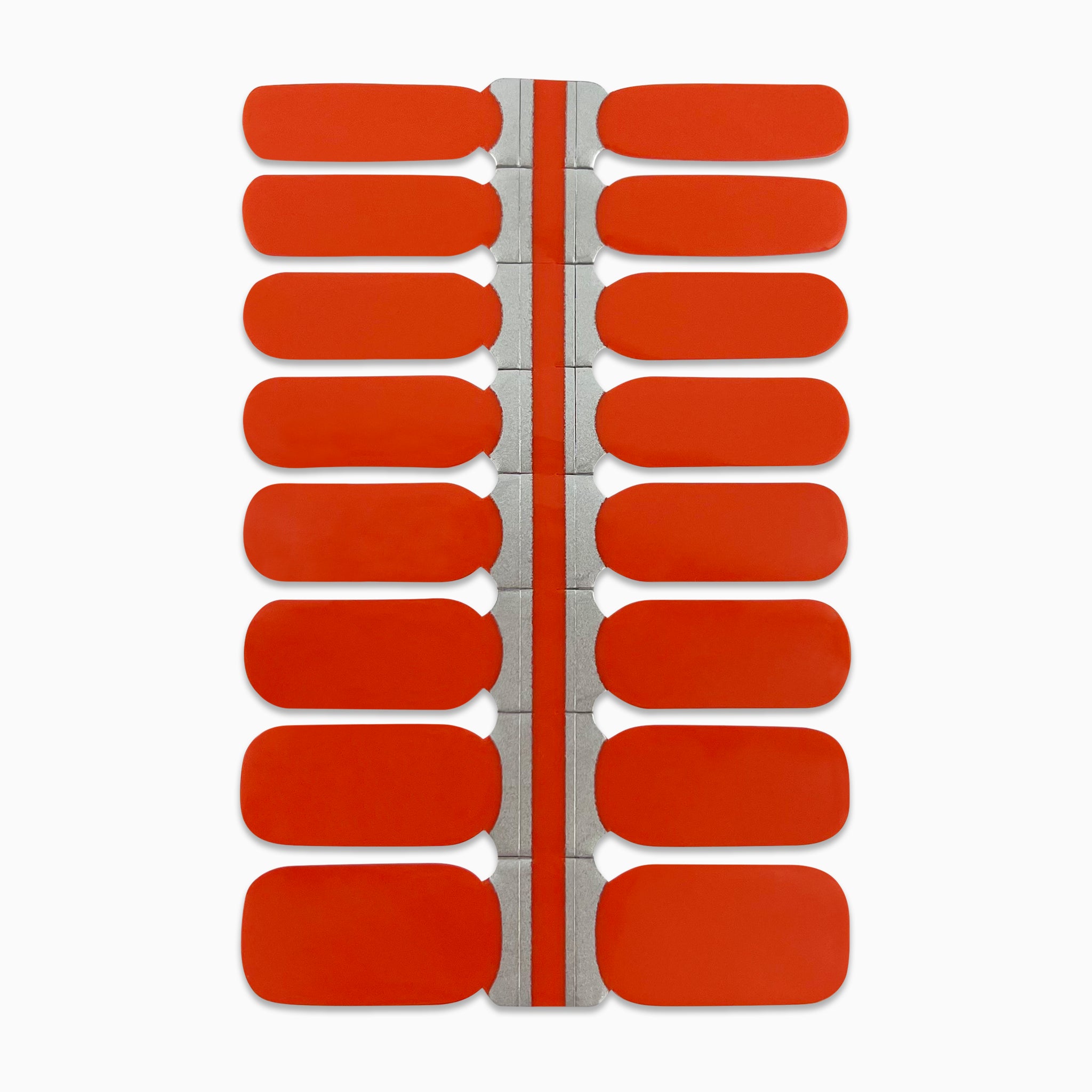 Nagelstickers in koraalrood op witte achtergrond