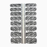 Nagelstickers met zwart-witte zebraprint op witte achtergrond