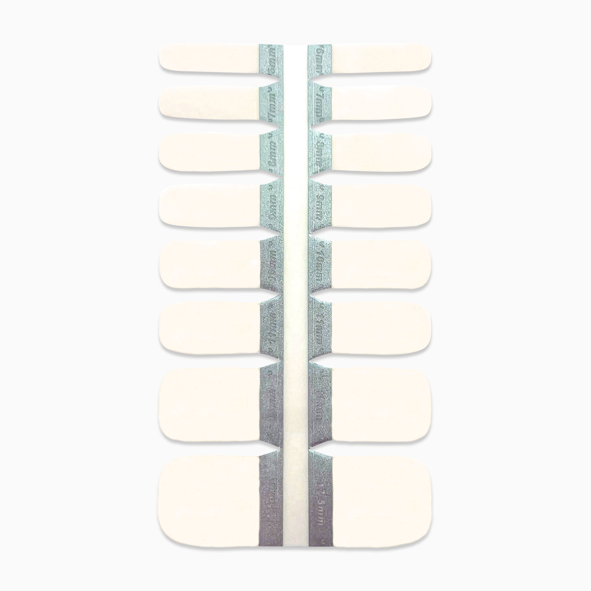 Productfoto van witte teennagelstickers op witte achtergrond