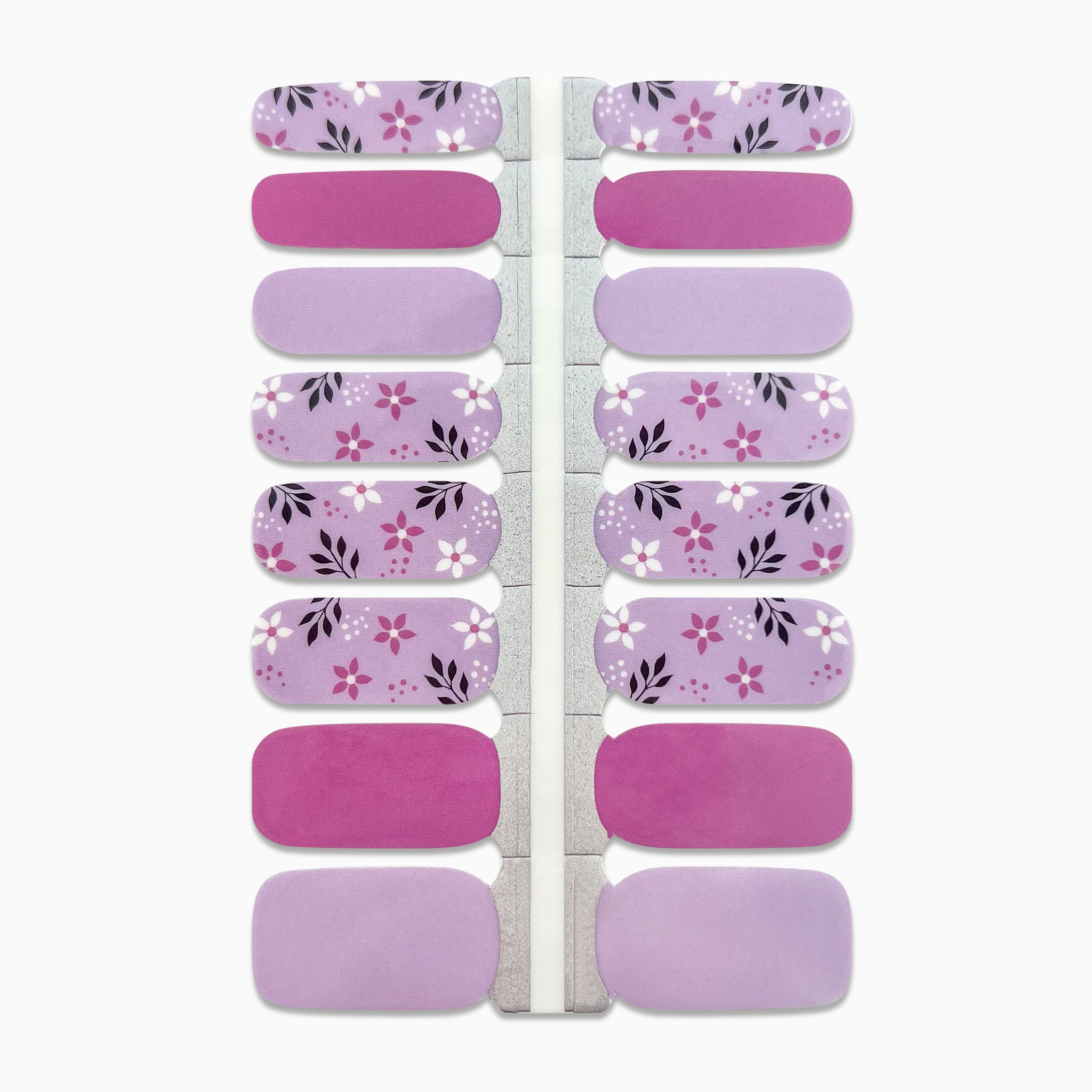 Productfoto van nagelstickers met lila en bloemen op witte achtergrond